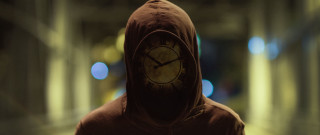 Hooded clock face dark room - les automatiste free wallpaper