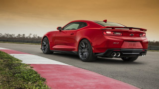 Red sports car road curb - line free wallpaper