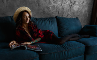 Woman couch hat book blue - her lap free wallpaper