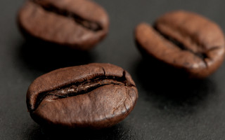 Coffee bean closeup hyperrealism depthoffield - product photography free wallpaper