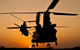 Helicopter sunset backlit military silhouette - a helicopter free wallpaper for desktop