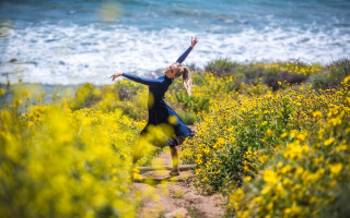 Dancing woman blue dress ocean - carey morris free wallpaper