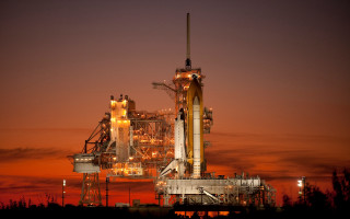 Industrial plant night red glow - free space wallpaper for desktop