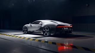 Silver sports car dark garage 3 - a dark garage free wallpaper