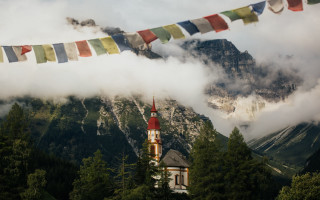 Church steeple mountain clouds trees - cinematic photography free wallpaper for desktop