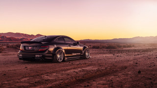 Desert sunset mountains car clouds - the middle of a desert free wallpaper