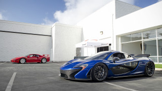 Blue sports car parking lot 22 - a white building free wallpaper