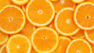 Orange slice orange plate glass - a group of oranges free wallpaper