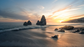 Beach rocks water sunset clouds 2 - the rock free wallpaper