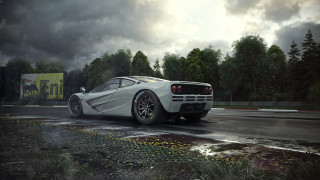 White sports car wet road - a white sports car free wallpaper