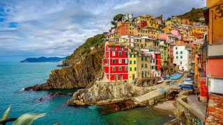 Colorful village cliff ocean beach - the ocean and a beach free wallpaper