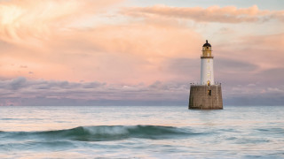 Lighthouse pier ocean pink sky - a lighthouse free wallpaper