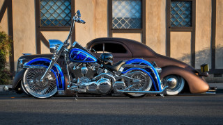 Blue motorcycle car street building - a car in the background free wallpaper