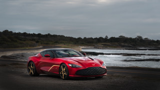 Red sports car ocean road - adam szentpétery free wallpaper