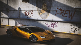 Yellow sports car graffiti wall 2 - side and a person free wallpaper