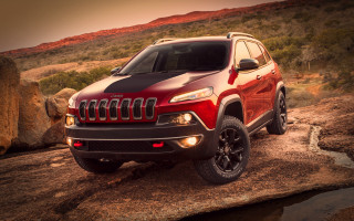 Red jeep rocky hillside water - a red jeep free wallpaper