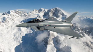 Fighter jet snow mountains pilot - over a snow free wallpaper