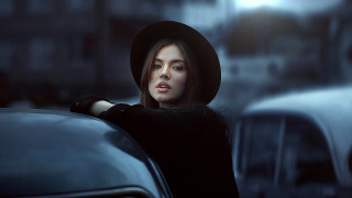 Woman black hat city street 2 - a black hat free wallpaper