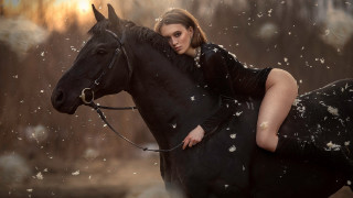 Woman horse snowflakes fashion puzzle - a horse in the background free wallpaper