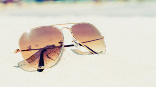 Sunglasses beach ocean sun reflection - a pair of sunglasses free wallpaper