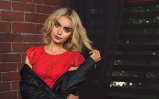 Woman red top hands hips - a red top free wallpaper