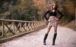 Woman skirt boots fence fashion - a woman in a skirt free wallpaper