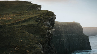 Cliff overlooking ocean lighthouse nature - evaline ness free wallpaper