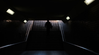 Person stairs dark room light - a set of stairs free wallpaper