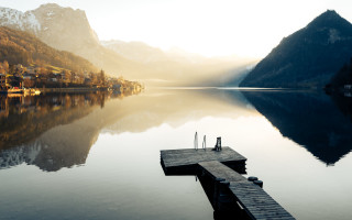 Lake mountain dock person sunset - a lake free wallpaper