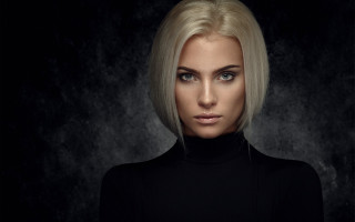 Blonde woman black shirt dark - a dark room free wallpaper for desktop