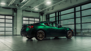 Green car garage 3d render - a green car free wallpaper