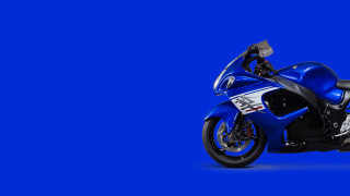 Blue motorcycle white stripe black - against a blue background free wallpaper