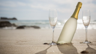 Champagne beach ocean shadow flutes - the ocean in the background free wallpaper