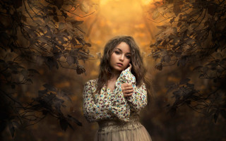 Woman holding white object autumn - a white object free wallpaper