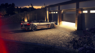 Sports car night garage open - a sports car free wallpaper