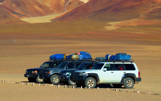 Desert cars luggage mountains rocks - luggage free wallpaper