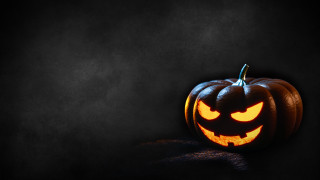 Carved pumpkin glowing eyes gothic - ambient free wallpaper