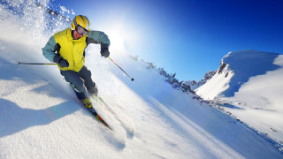 Man skiing snowy slope sunny 2 - a snow free wallpaper for desktop