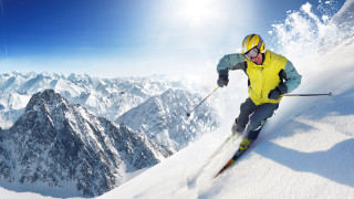 Man skiing snowy slope sunny - a man riding free wallpaper