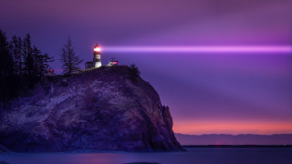 Lighthouse rock purple sky hologram - a purple sky in the background free wallpaper for desktop