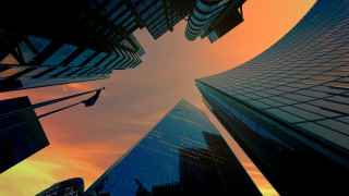 Cityscape sunset skyline fence trees - tall building free wallpaper