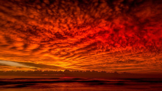 Red orange sky sunset ocean - apocalyptic free wallpaper
