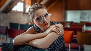 Woman glasses sitting crossed arms - a chair free wallpaper