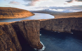 Mountain lake bridge sunset ocean - mountain and cliffs free wallpaper