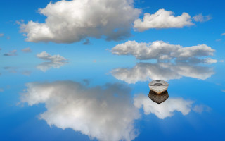 Boat water cloudy sky sunbeam - a body of water under a cloudy sky free wallpaper