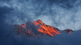 Mountain red peak clouds sunset - volumetric light free wallpaper