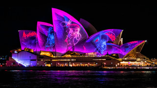 Large building lit design night - albert namatjira free wallpaper