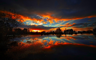 Sunset reflecting lake trees clouds - colorful cloud free wallpaper