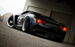 Black sports car cobra 3d - a garage door free wallpaper