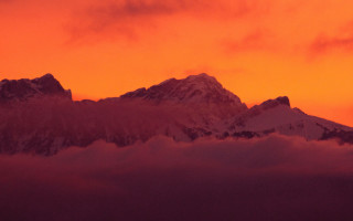 Mountain range red sky clouds 5 - a red sky in the background free wallpaper